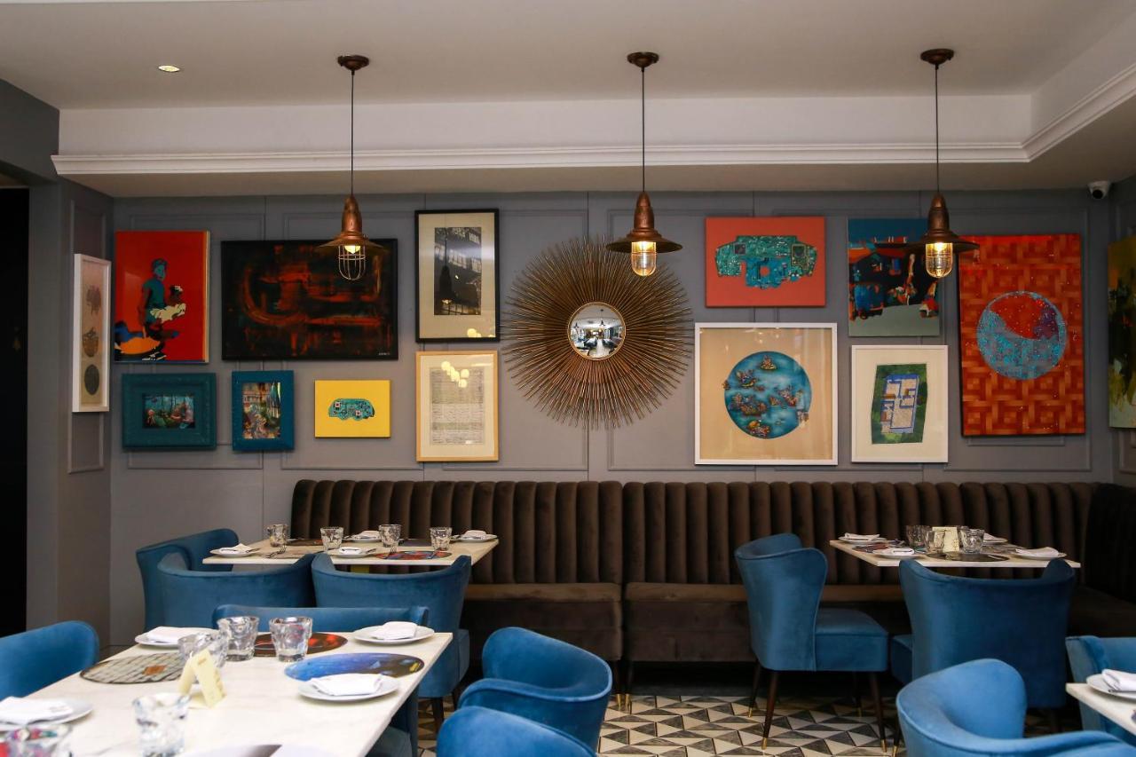 Ambiance Boutique Art Hotel ラホール エクステリア 写真 Interior of the restaurant